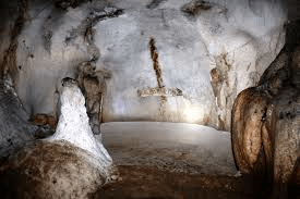 holy figures and scenes inside mystical cave