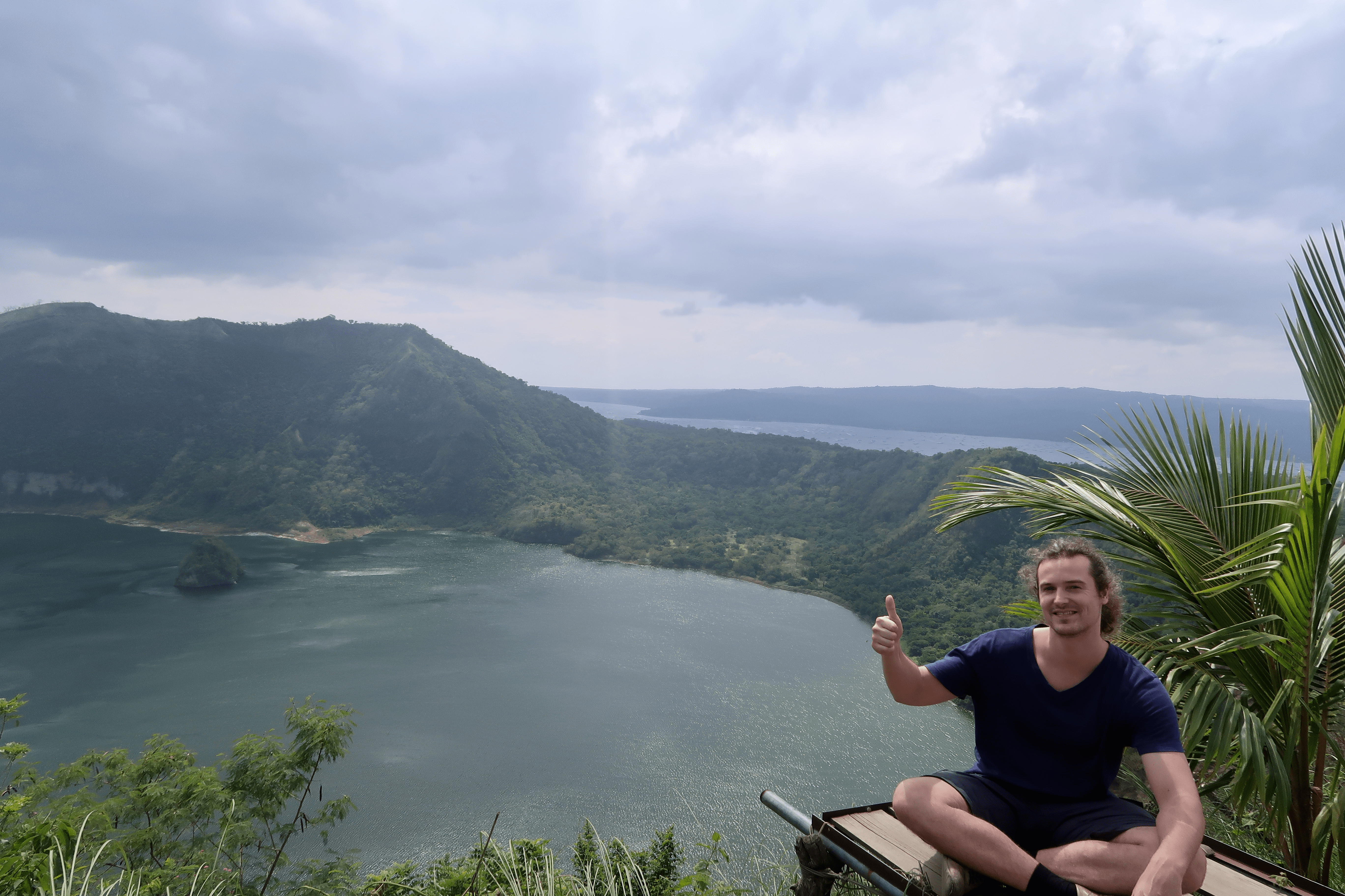 Thumbs up for the taal crater at volcano island, taal volcano