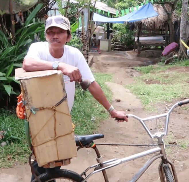 Local Filipino with bike and bell